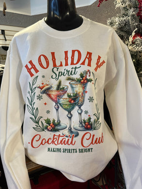 A white crewneck sweatshirt with 'HOLIDAY SPIRIT' and 'MAKING SPIRITS Bright' printed on the front, displayed on a mannequin.